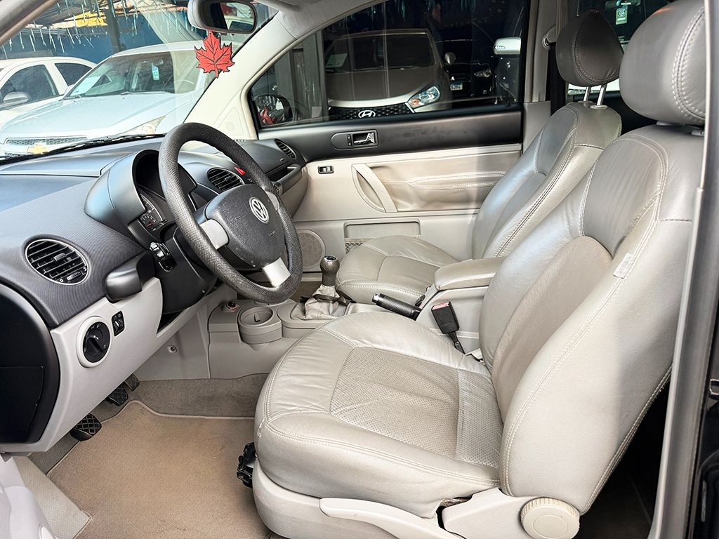 VOLKSWAGEN NEW BEETLE