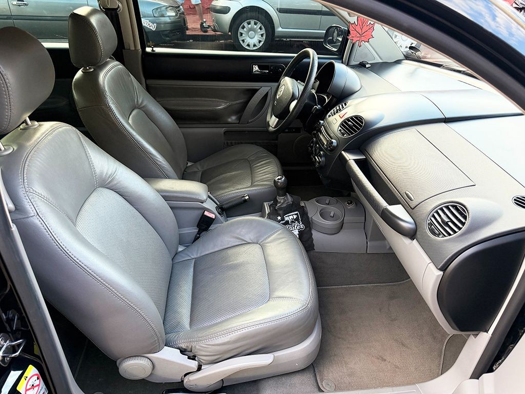 VOLKSWAGEN NEW BEETLE